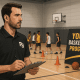 Youth basketball coach planning training session with young players