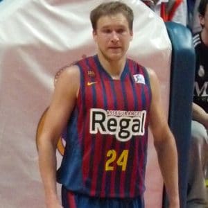 Brad playing basketball in an overseas professional basketball league