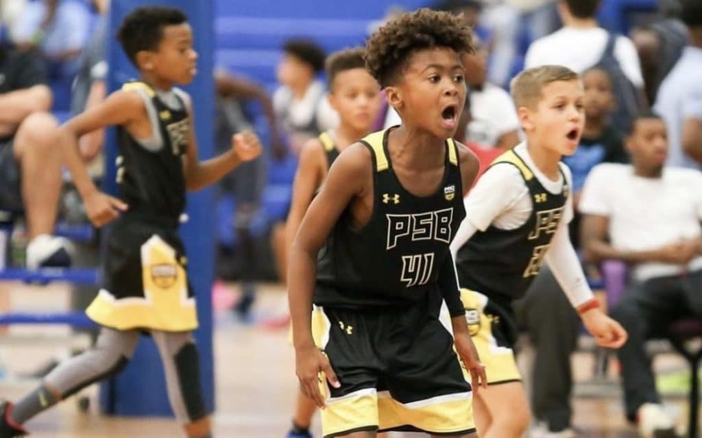 Boy shouting during Pro skills Youth Basketball game