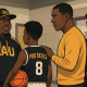 Youth basketball player and parent choosing between two AAU coaches, representing different team cultures.