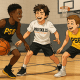 Youth basketball players in PSB colors playing a fun mini-game in a gym setting to avoid burnout.