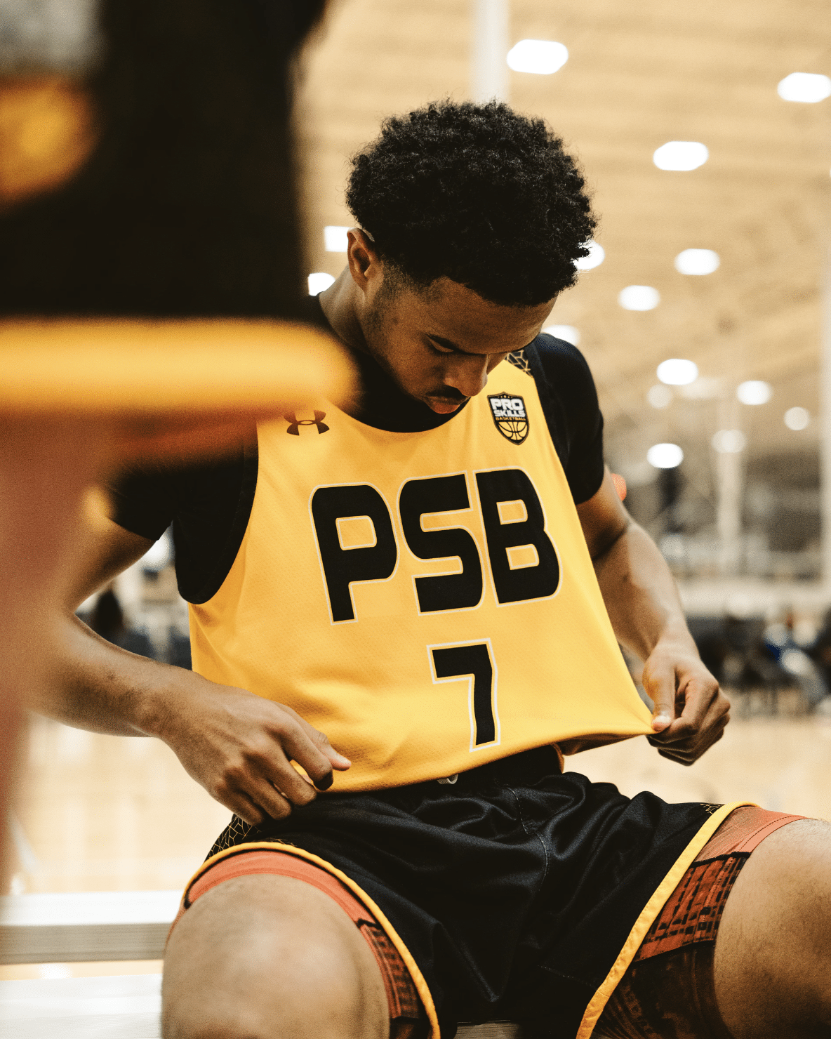 boys bench closeup number 7 yellow psb jersey tournament 2