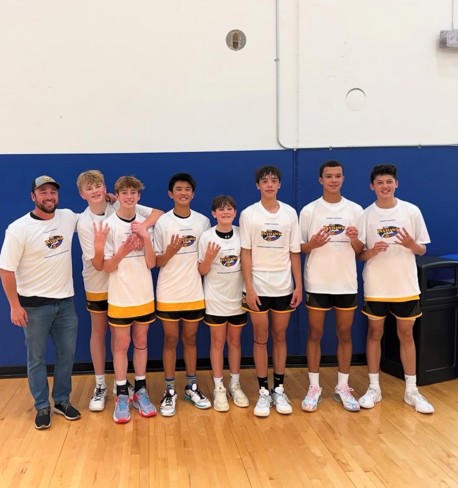 Youth basketball team off-season group photo with coach