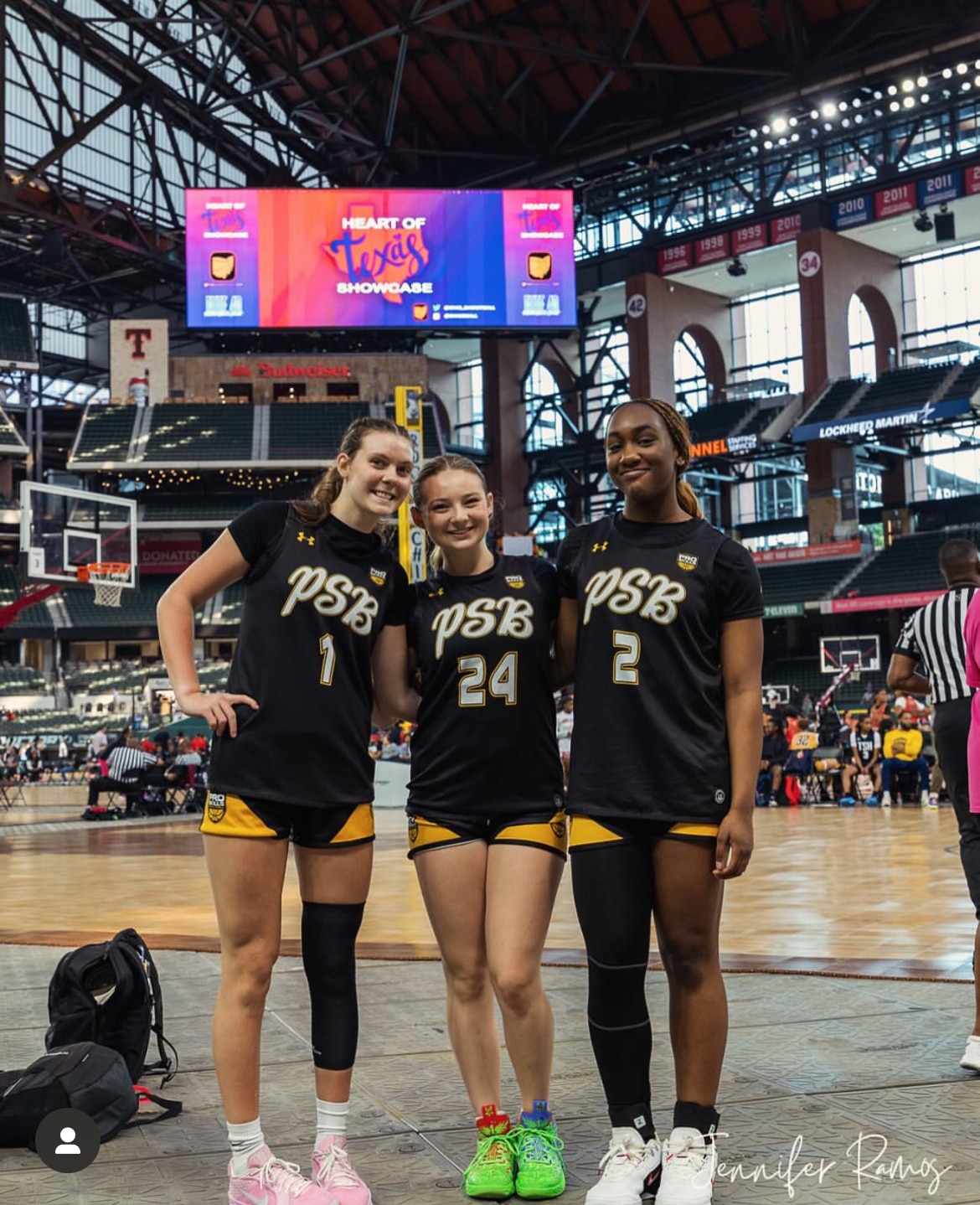Youth basketball teammates posing together at a tournament