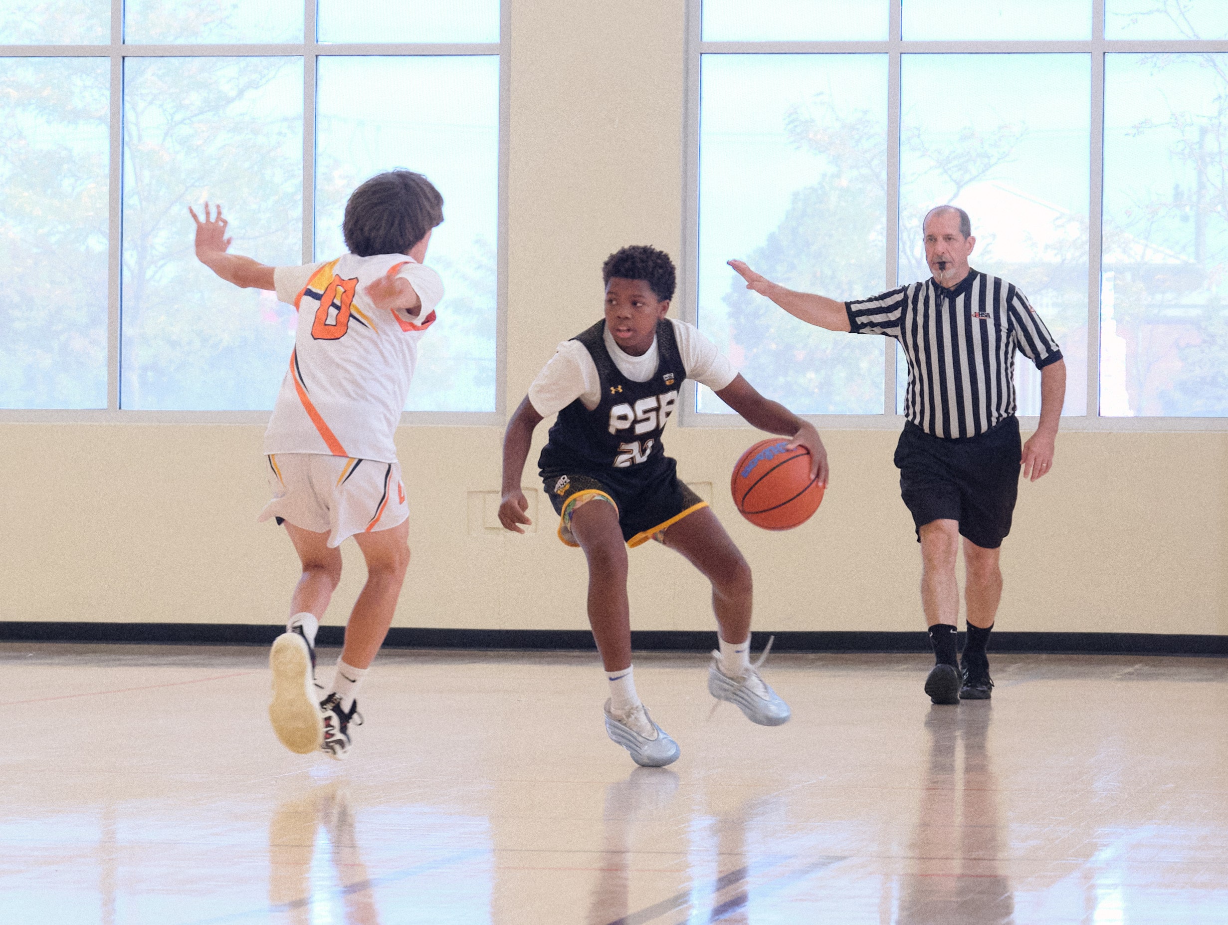 Ball handler being pressured by a defender