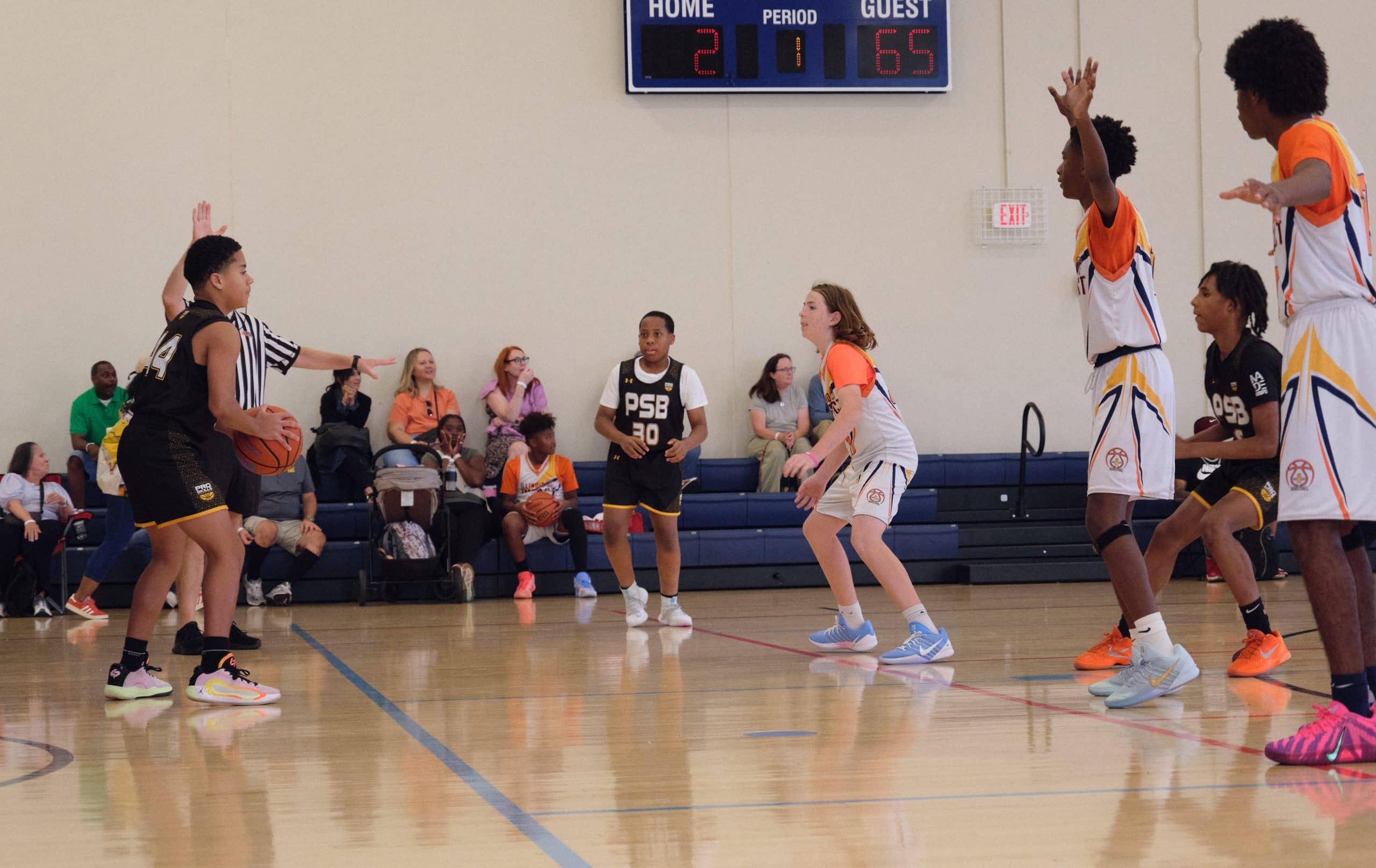 Youth basketball player scoring in the paint