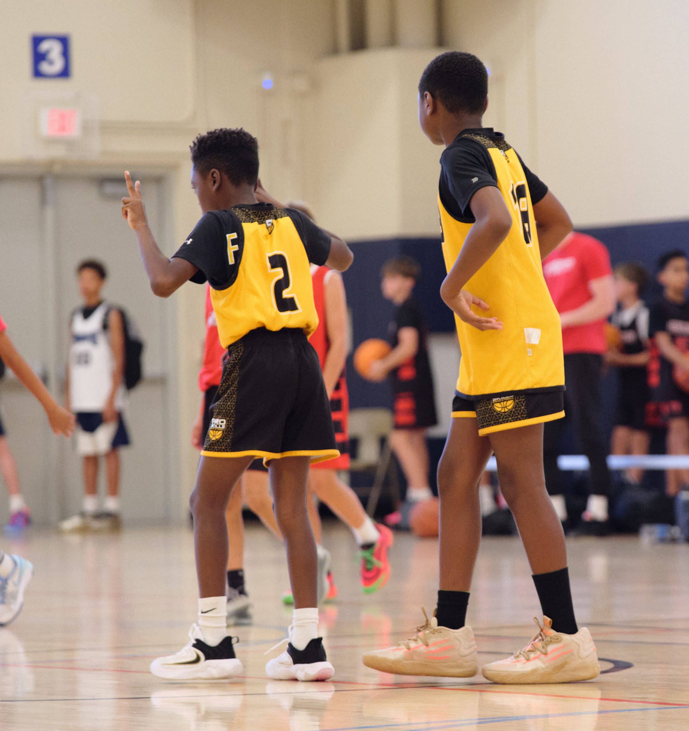 Youth basketball players competing in a game