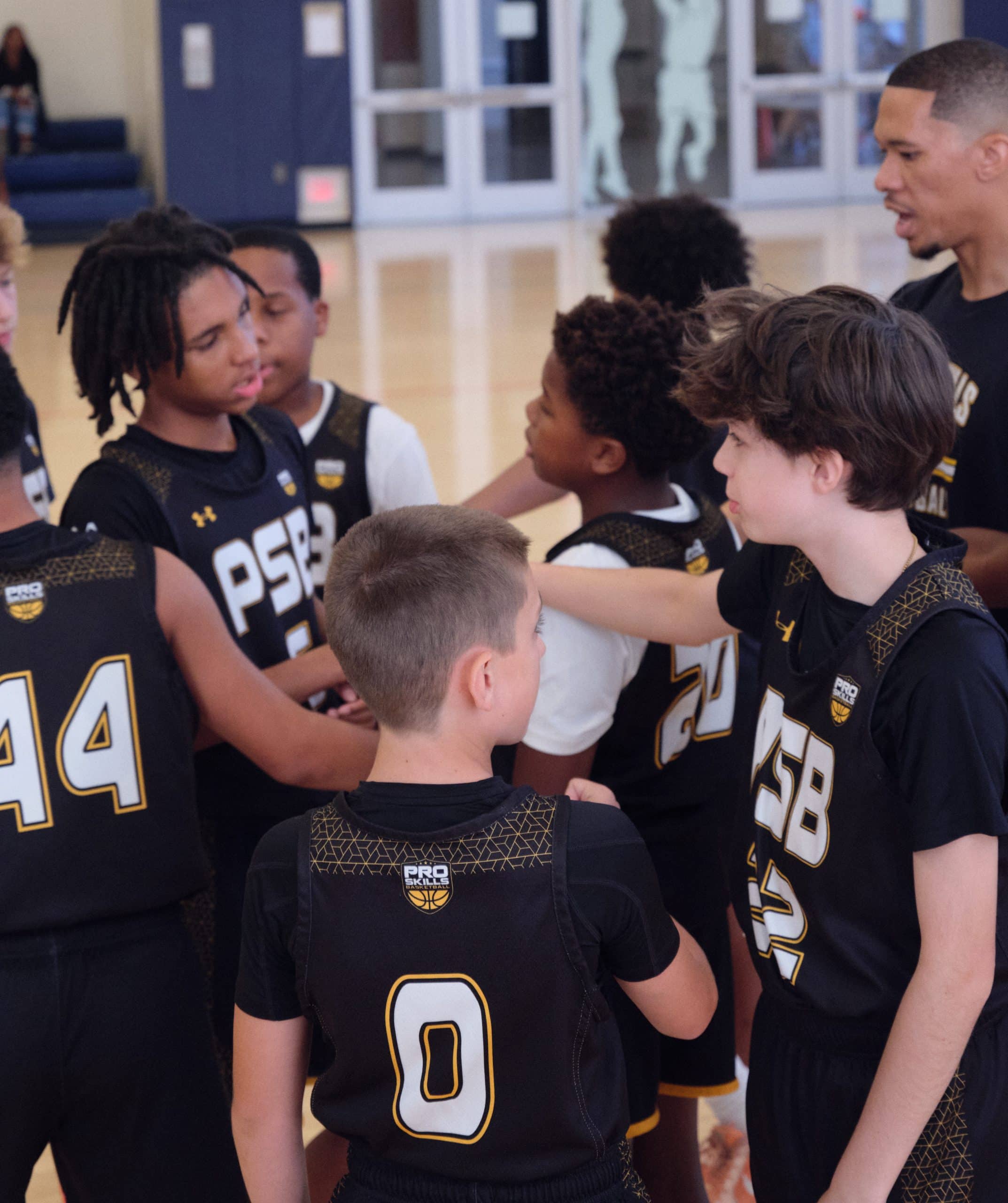 Basketball team huddle showing competitive focus