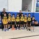 PSB boys team photo with coaches in a gym